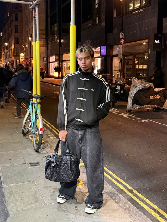 Black streetwear jacket featuring traditional Chinese loop buttons