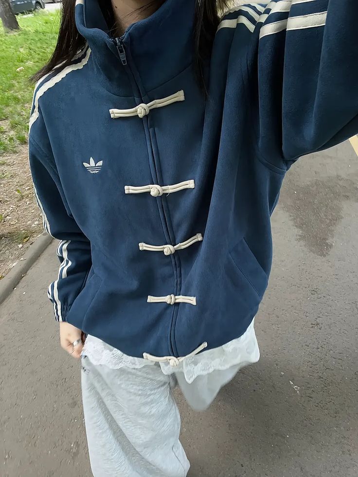 Fusion streetwear jacket featuring traditional Chinese knot buttons
