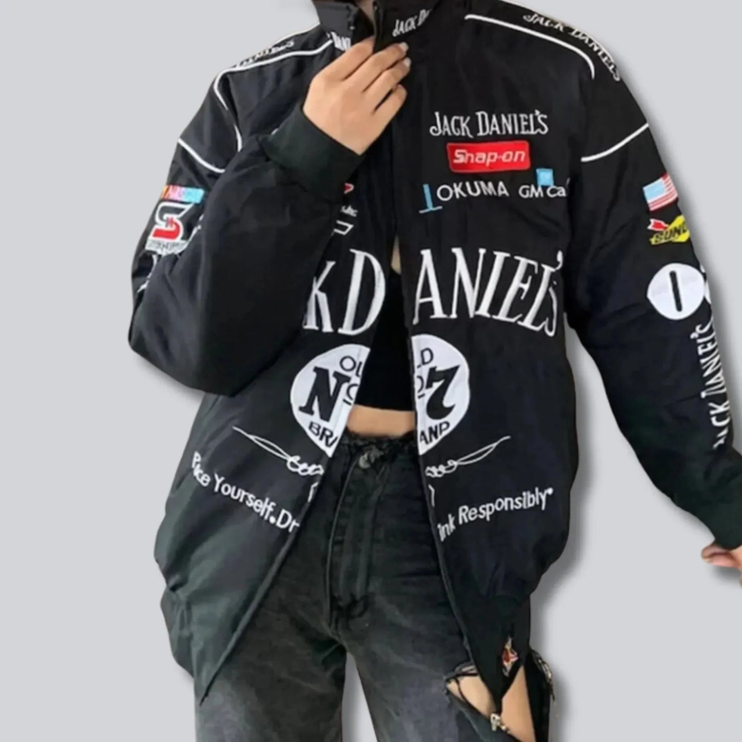 Jack Daniel streetwear parachute jacket styled with jeans casual look
